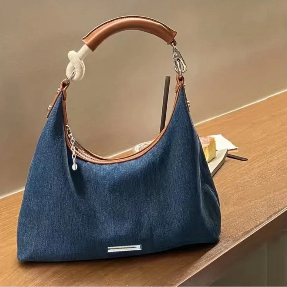 Blue canvas and brown faux leather handbag